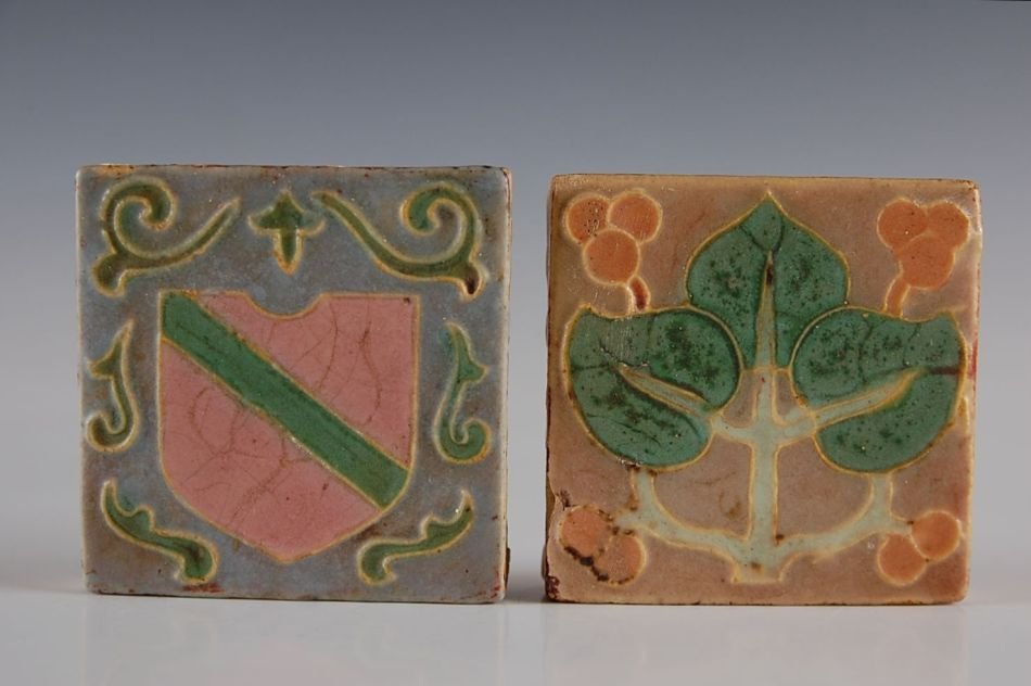 TWO WHEATLEY THREE COLOR ART POTTERY TILES: One with ink stamp of Cambridge Wheatley, measurements of each are 3 x 3 inches.
