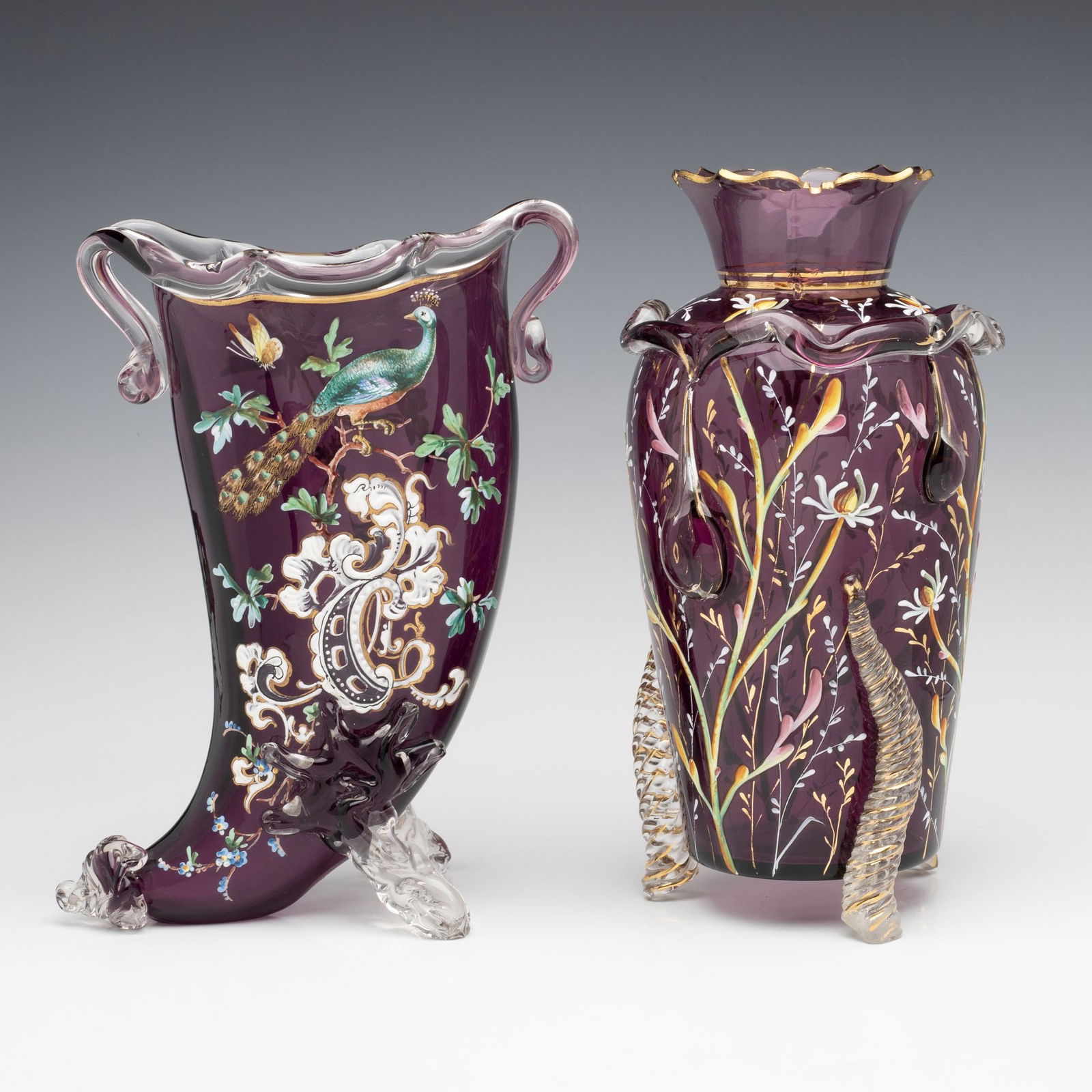 MOSER AND OR HARRACH VICTORIAN ART GLASS WITH ENAMELING: Ludwig Moser Two interesting pieces with exotic applications and fired on enamel decoration. Measures 9.75 x 4.75 and 9.25 x 6.5 x 3.5 inches. Without proof of exemption, be aware that internet sales