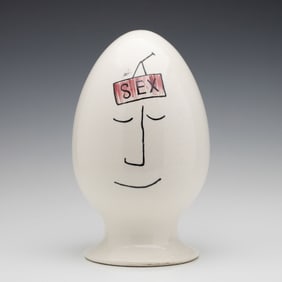 A MID TO LATE 20C POTTERY EGGHEAD AFTER LAGARDO TACKETT