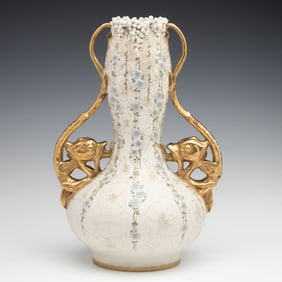 A 13-INCH AMPHORA VASE WITH GRIFFINS AND SPIDER WEBS