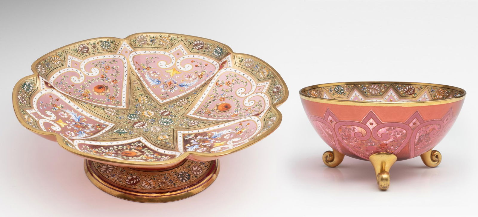 AN UNUSUAL MOSER FOOTED FINGER BOWL AND SIMILAR COMPOTE: Ludwig Moser Early 20th Century 1. An unusual Moser footed finger bowl finely gilt and enameled in hand painted Islamic influence motif of more than a dozen colors of fired-on enamel, all finished in