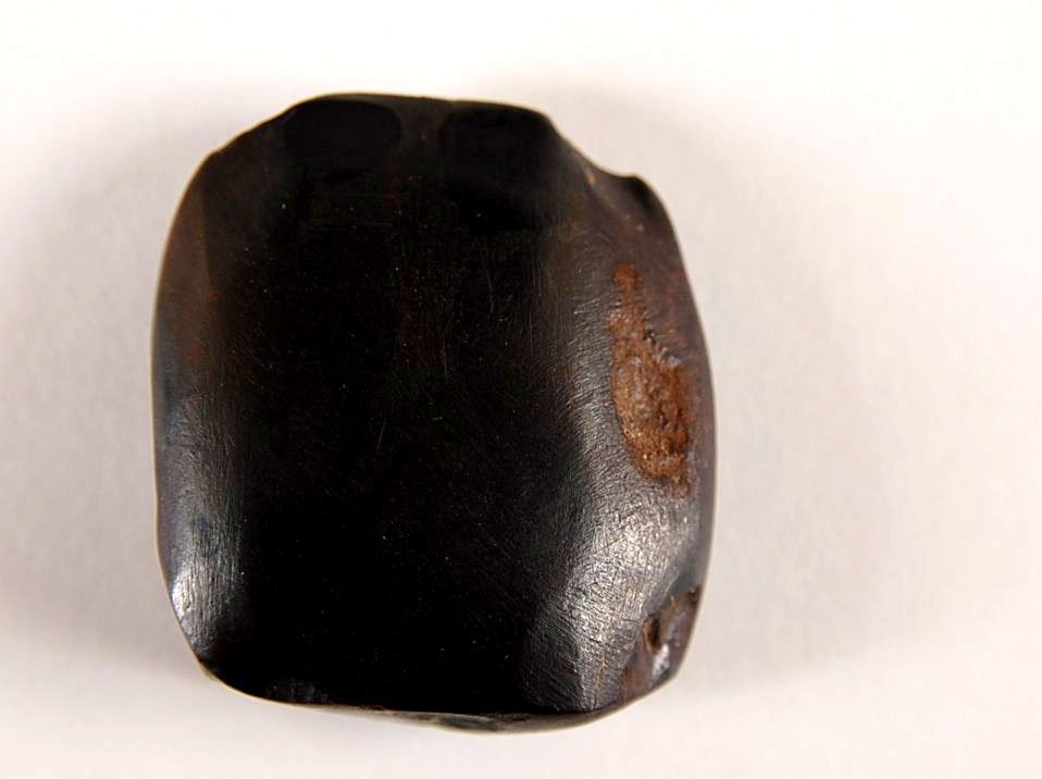 HEMATITE CELT, 1.5 INCHES: Johnson Co. MO. 1.5 x 1.25 inches. Guaranteed Authentic. This lot is subject to a 21 day return privilege guarantee. If, in the opinion of Tom Davis, Bill Jackson or Roy Motley, this lot is determined