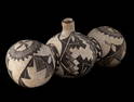 A 19TH CENTURY ACOMA TRI-LOBE PUEBLO POTTERY CANTEEN