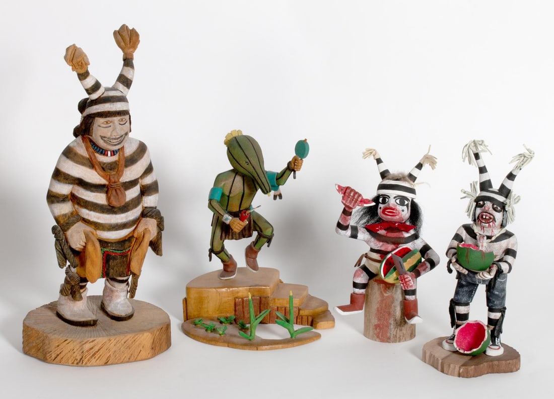 KOSHARE CLOWN AND OTHER CARVED KATSINA DOLLS: The collection is offered with artist's signatures as shown. Sizes range from 7 to 12 inches tall. Without proof of exemption, be aware that internet sales tax applies to all Internet transactions and