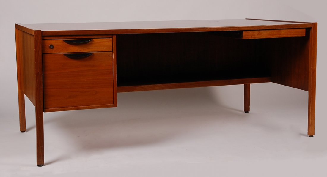 JENS RISOM WALNUT DESK: Makers tag inside the left upper drawer. Measures 28.5 x 68 x 34 inches.