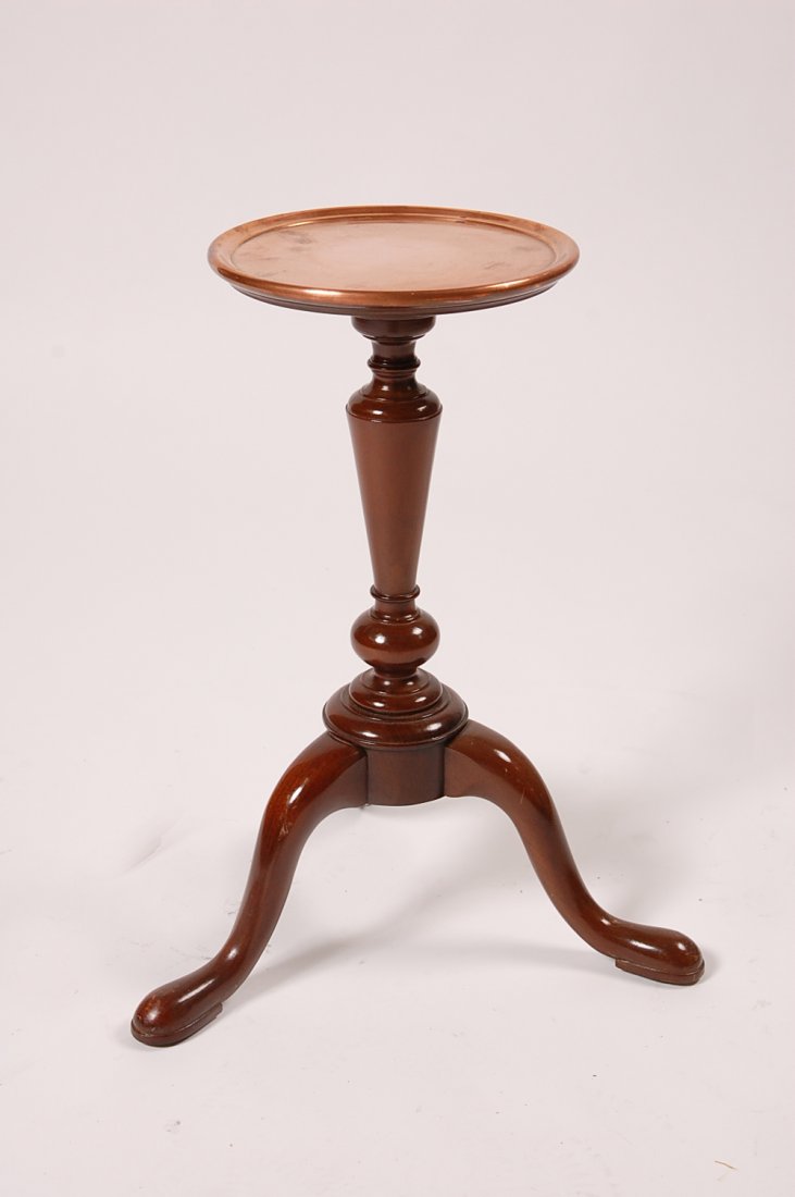 KITTINGER TRIPOD STAND WITH COPPER TOP: Branded mark of Restoration Williamsburg, Kittinger. Measures 21.75 x 17 inches.