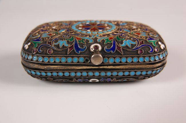 GUSTAV KLINGERT RUSSIAN BOX CIRCA 1890: A Russian silver box with polychrome enamel cloisonné exterior and gilded interior. Circa 1890s, standard mark of 84 and initials GK. Measures 2 x 3 inches.