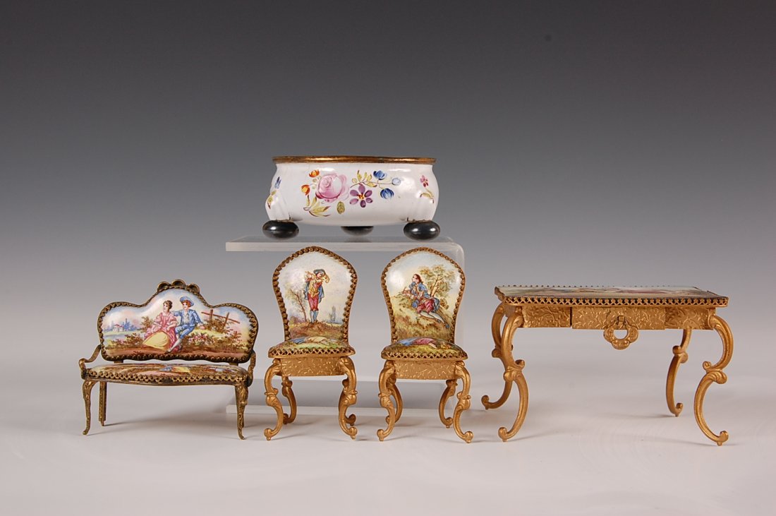VIENNESE ENAMEL MINIATURE FURNITURE: Table marked Austria measures 2 x 3.25 x 2.5 inches. 2.5 x 1.25 inches. Sofa 2 x 2.5 inches. Cellar 1.25 x 2.75 inches.