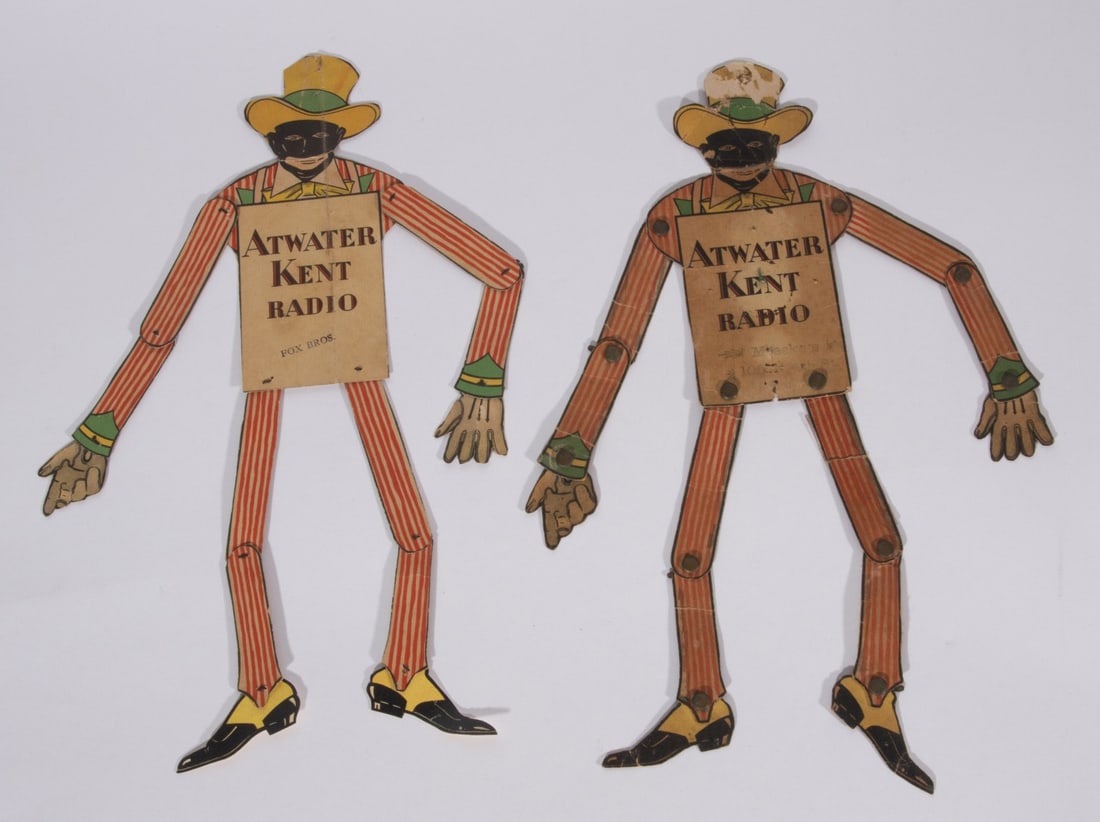 ATWATER KENT ARTICULATED PAPER ADVERTISING FIGURES: The two as shown. Each measures 13 inches tall. Without proof of exemption, be aware that internet sales tax applies to all Internet transactions and local sales tax may apply to local pick-up transac