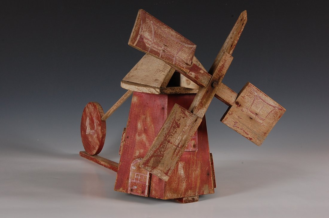 FOLK ART WHIRLIGIG WITH MILL: Measures 12 x 19 inches.
