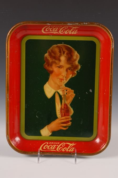 1927 COCA COLA SERVING TRAY: Girl drinking a coke with a straw. Measures 13.5 x 10.5 inches.