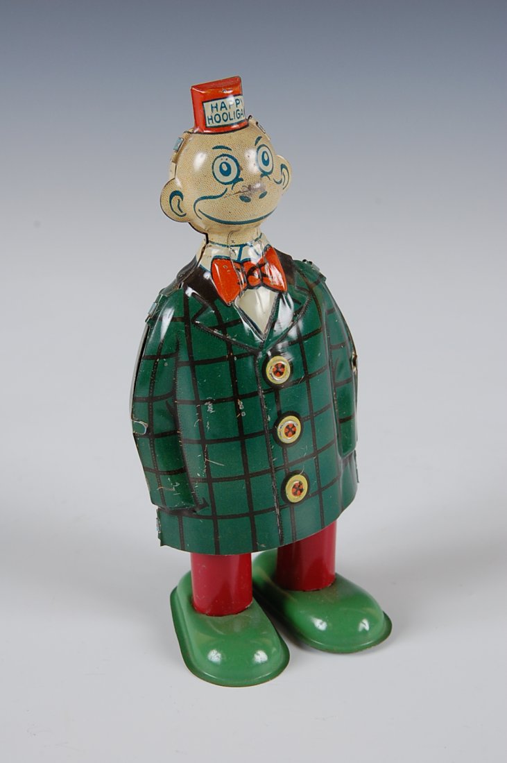 HAPPY HOOLIGAN TIN WIND-UP TOY, CHEIN Co.: Measures 6.5 inches.