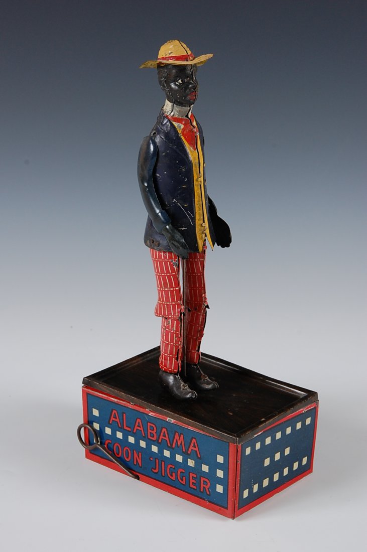 TOMBO ALABAMA COON JIGGER W/UP TOY, STRAUSS CO.: Measures 10.5 inches.