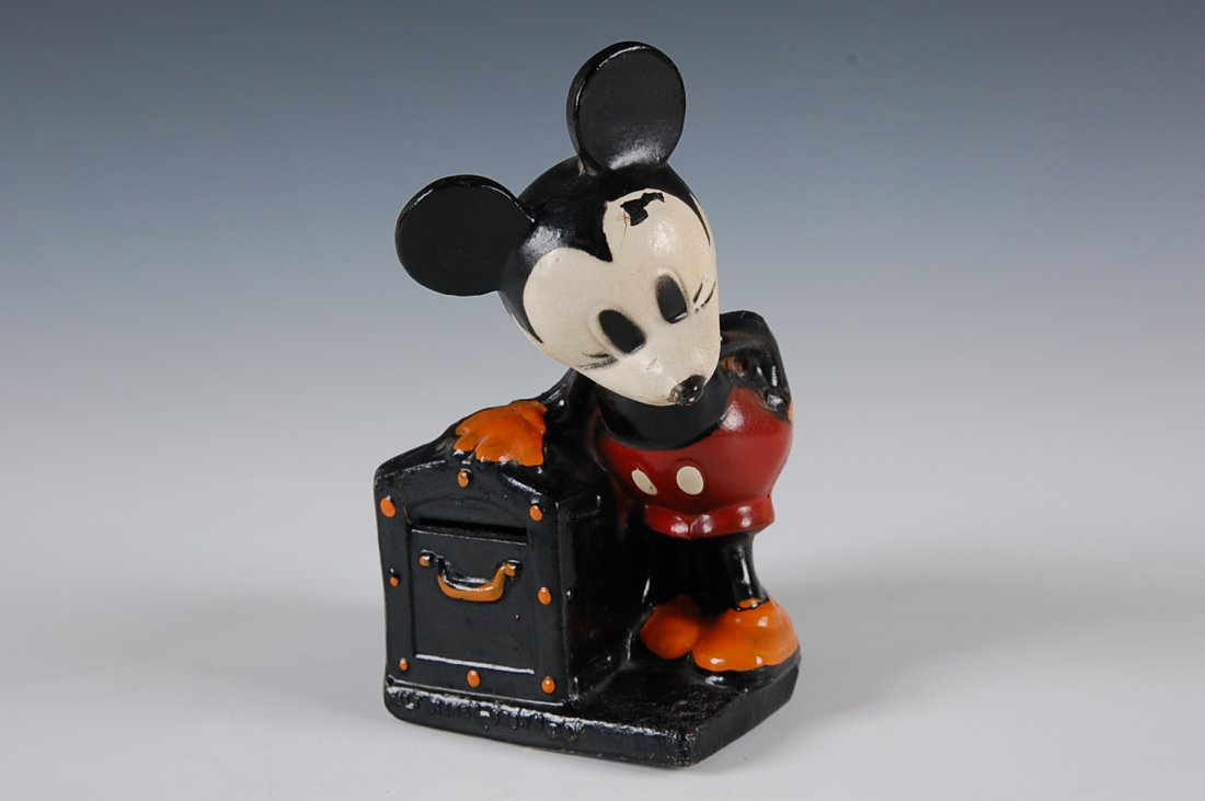 MICKEY MOUSE TREASUR CHEST BANK, NODDER: Painted composition material marked Walt Disney. Measures 6 inches.