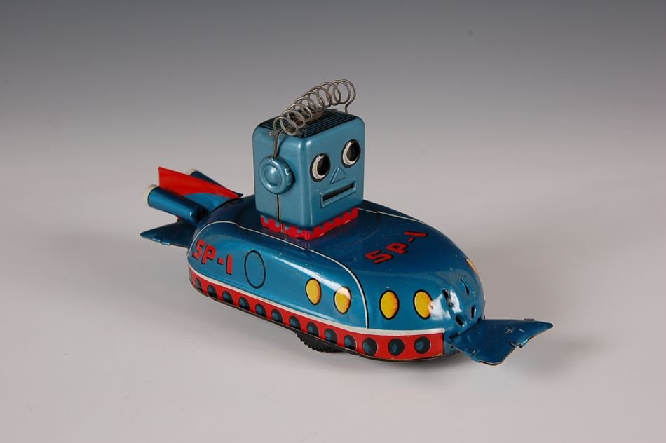 SP-1 SPACE CAR FLYING ROBOT TOY, JAPAN 1960s: Circa 1960s, measures leave by 6 inches, may be missing a front apparatus