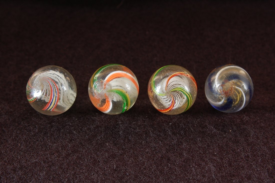 MARBLES LOT OF FOUR 7/8'' HAND MADE LATTICINIO SWIRL'S