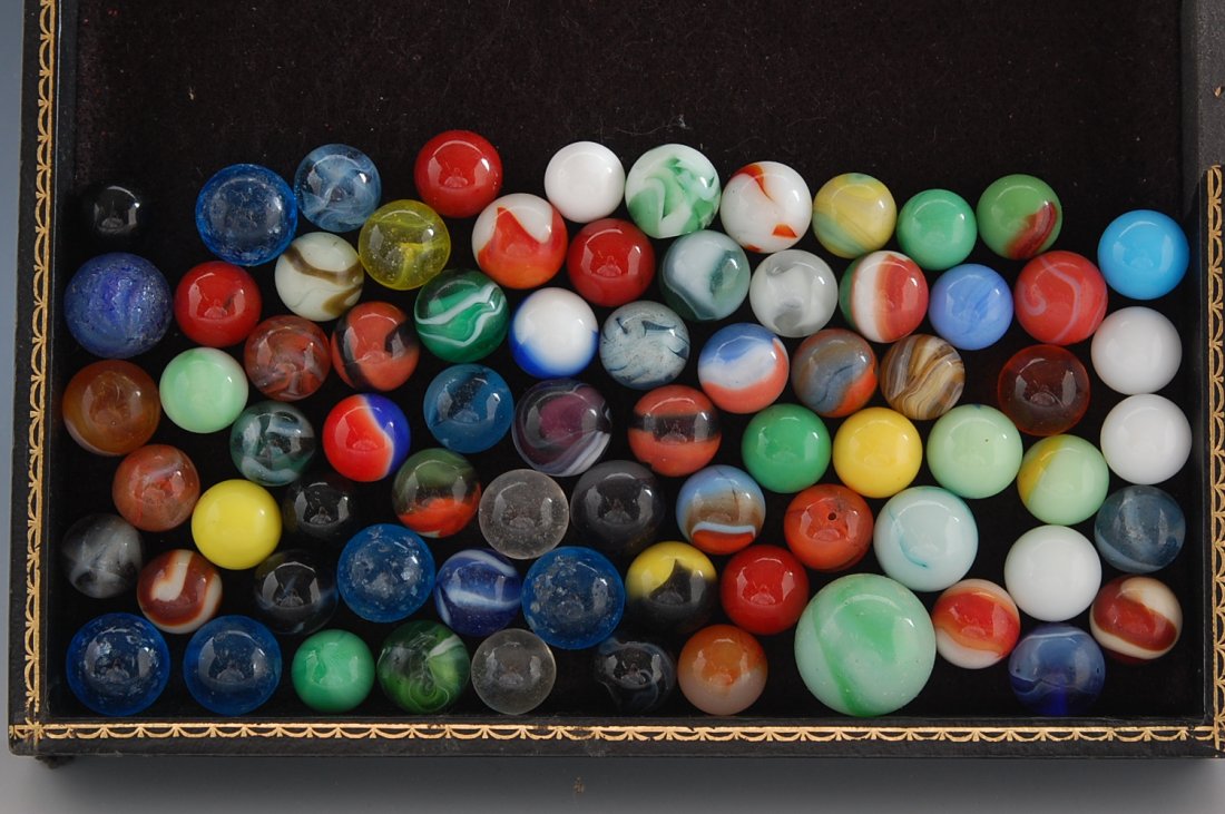 FLAT FULL OF MACHINE MADE MARBLES