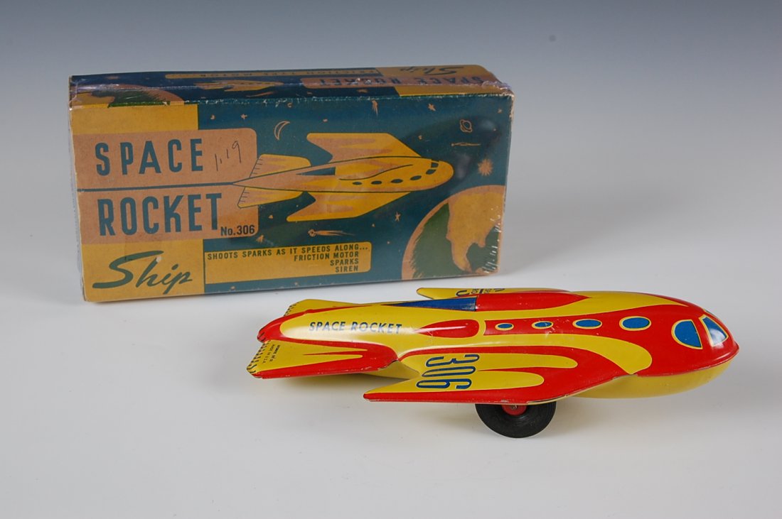 SPACE ROCKET SHIP TIN LITHO FRICTION TOY MIB: Made by Automatic Toy Company, Staten Island New York, number 306. Rocket measures 9 inches. Box measures 2.25 x 9 x 4.25 inches.