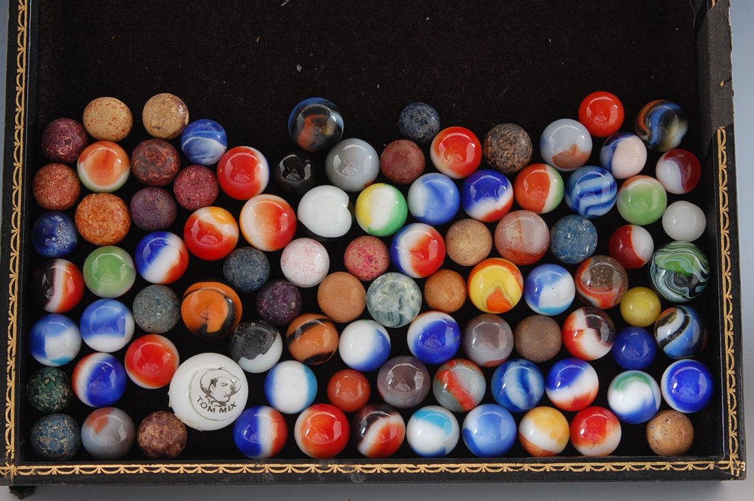 FLAT FULL OF MACHINE MADE MARBLES,
