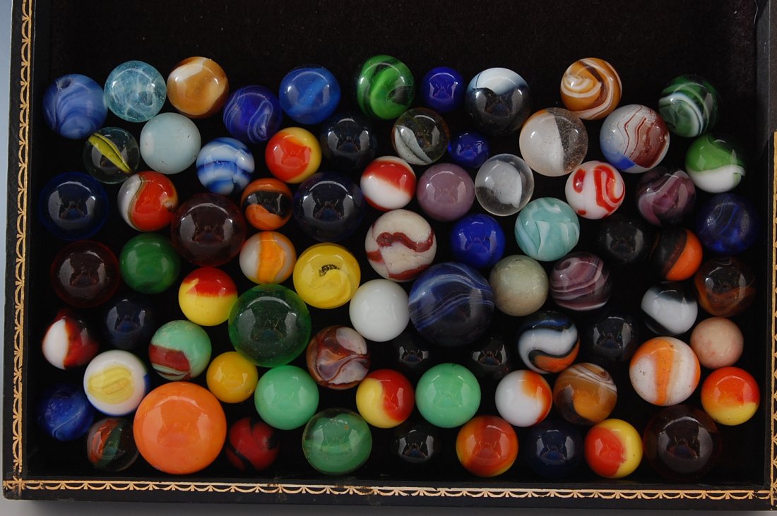 FLAT FULL OF MACHINE MADE MARBLES,