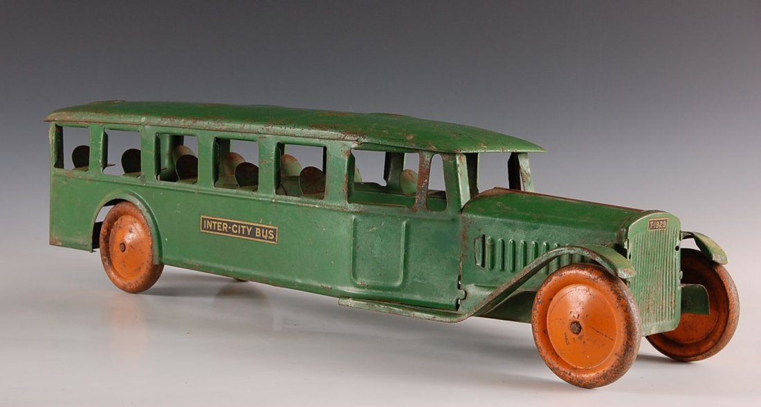 T-1929 INTER CITY PRESSED STEEL TOY BUS: Measures 6 x 6 x 32 inches.