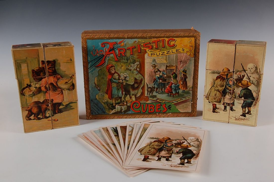 1882 LITHO ON WOOD ARTISTIC PUZZLE BLOCKS BY MCLOUGHLIN: Great Victorian boxed puzzle cubes or blocks that can be arranged in a number of different configurations. Included are nine big square blocks and eleven original chromolithograph prints that provide 