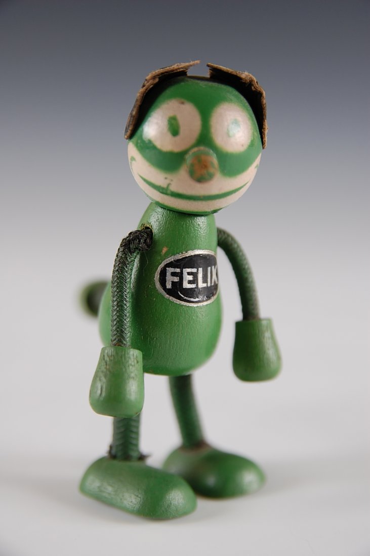 1930S FELIX THE CAT GREEN FLEX TOY FIGURE: Original decal, unusual green version measures 3 inches.