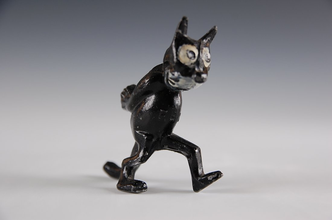 EARLY FELIX THE CAT WALKING, LEAD CAST FIGURE: An early version of Felix with excellent paint measures 2 3/4 inches top of the ear