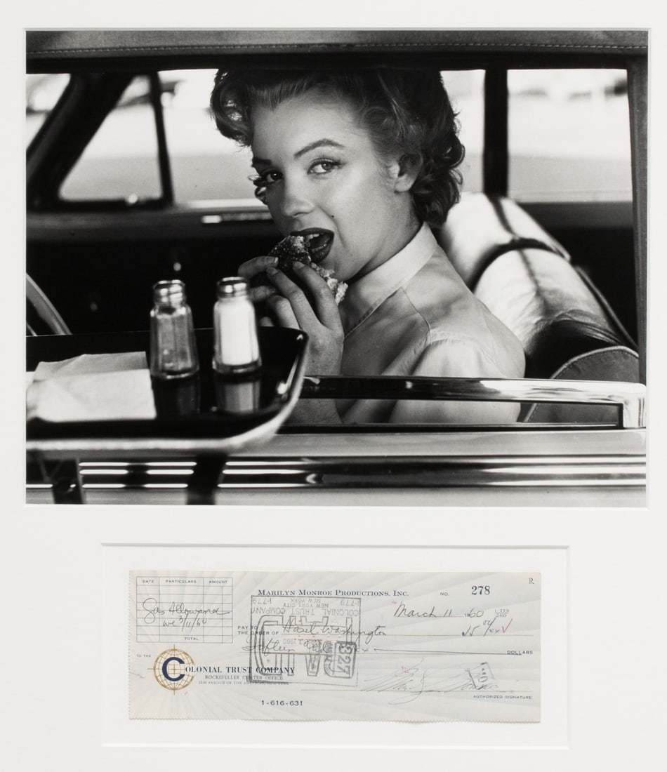 MARILYN MONROE 1960 SIGNED AUTOGRAPH CHECK PSA/DNA: The check to Hazel Washington, Marilyn's studio maid at Twentieth Century Fox, has been authenticated as shown verso. Sight size measures 9.5 x 12.5 with a framed size of 22.5 x 21 inches. Without pro