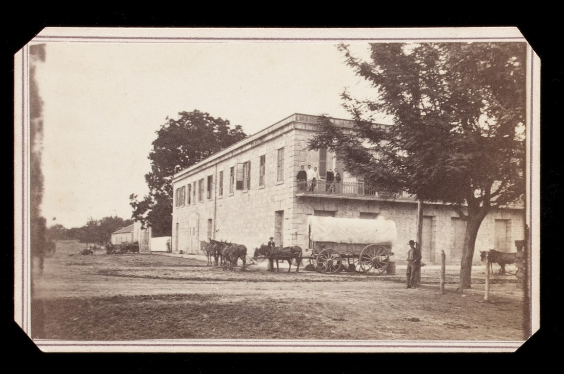 RARE IMPORTANT CDV VIEWS OF SAN ANTONIO BY HENRY DOERR: 1. Two views of the Vance Hotel with horse drawn freight wagons pulled up, one being inscribed, .'.military Officers and CS Storehouse.' The hotel structure was used by both the Federal Army and the C