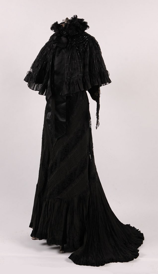VICTORIAN BLACK SATIN DRESS WITH HEAVY JET BEADING: Excellent to near mint condition, included is a mounted photograph of the original owner, Loretta Mead, 1855 – 1906.