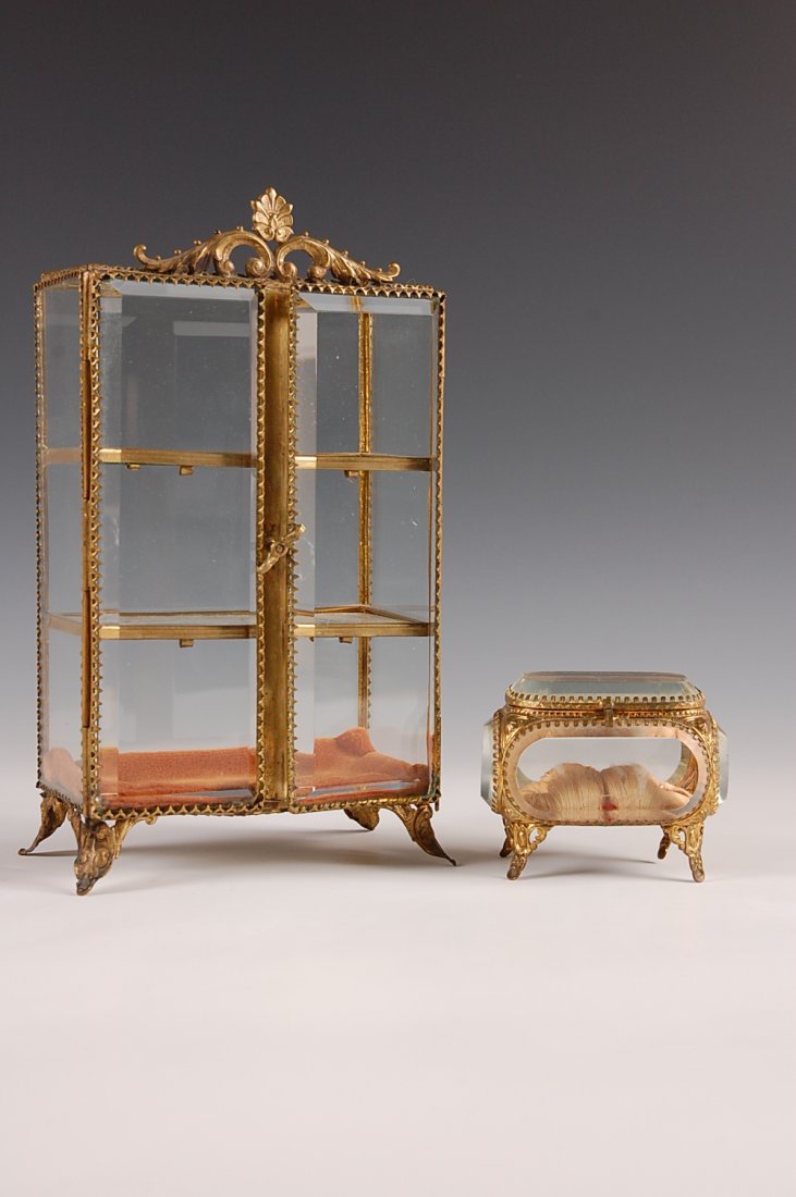TWO C. 1900 BEVELED GLASS AND BRASS JEWELRY CASES: Casket measures 3 x 3.5 x 2.5 inches. Cabinet measures 9.25 x 5.25 x 3 inches.