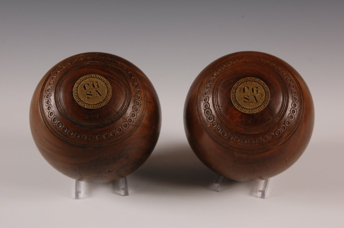 PAIR OF TAYLOR ROLPH LAWN BOWLING BALLS: Both marked 'Taylor Rolph, Ltd, London.' Measure approximately 4.75 inches.