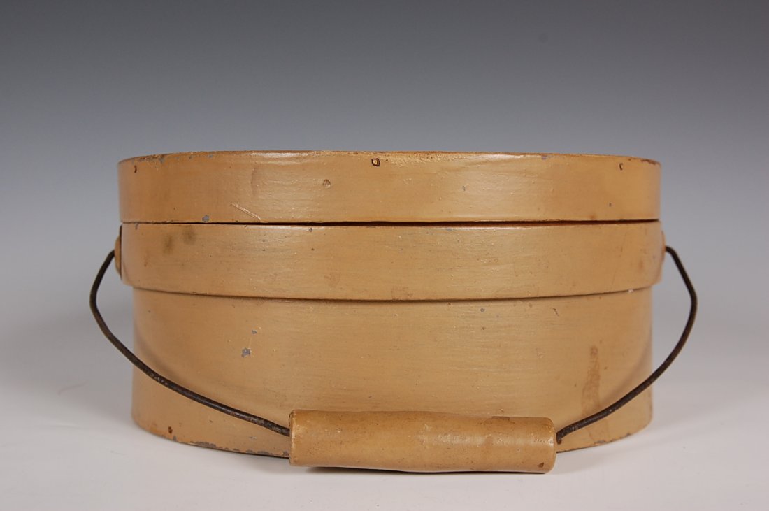 NEW ENGLAND BAIL HANDLE PANTRY BOX: Later mustard paint, wood handle on the bail. New England. Measures 4.25 x 9.25 inches.