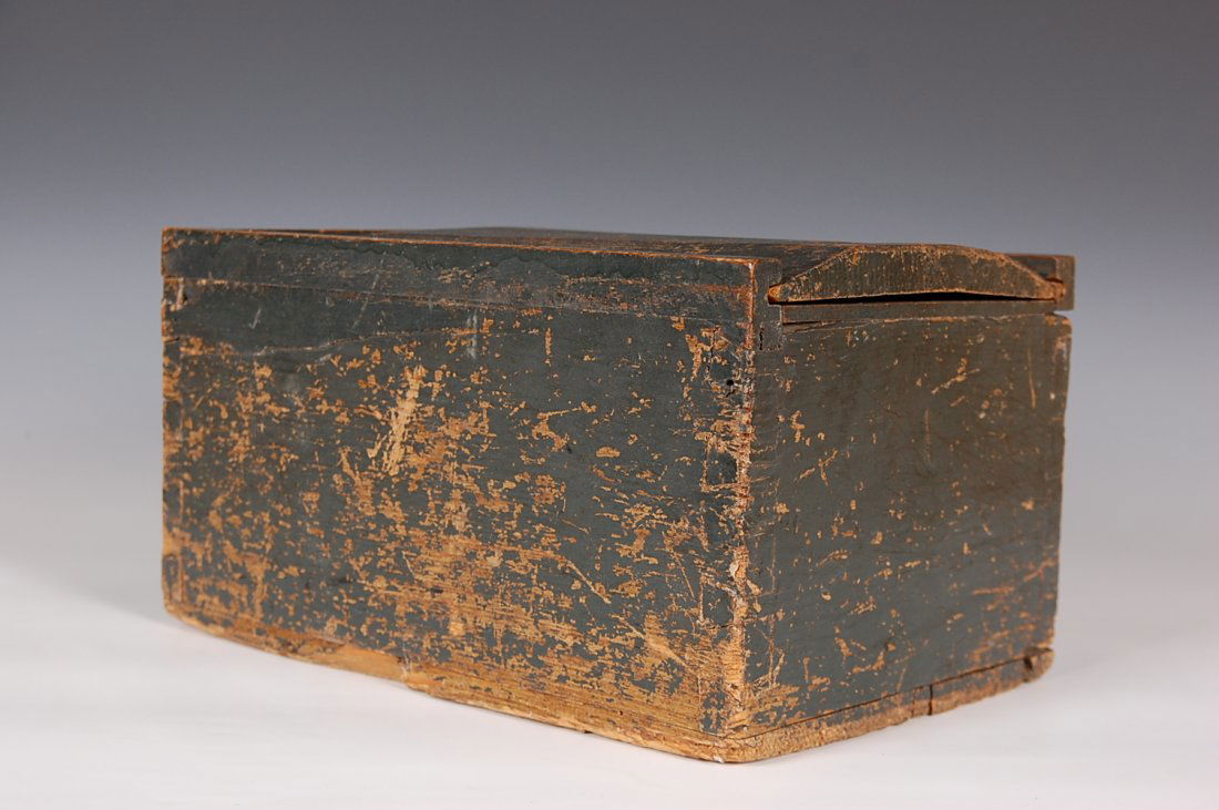 19th C. SLIDE LID SEED BOX WITH DIVIDED INTERIOR AND OL: Dovetailed case, heavy chamfered lid, green finish, nailed base, pine, divided interior with soft polished patina from use. Measures 9.5 x 14 x 7.5 inches.