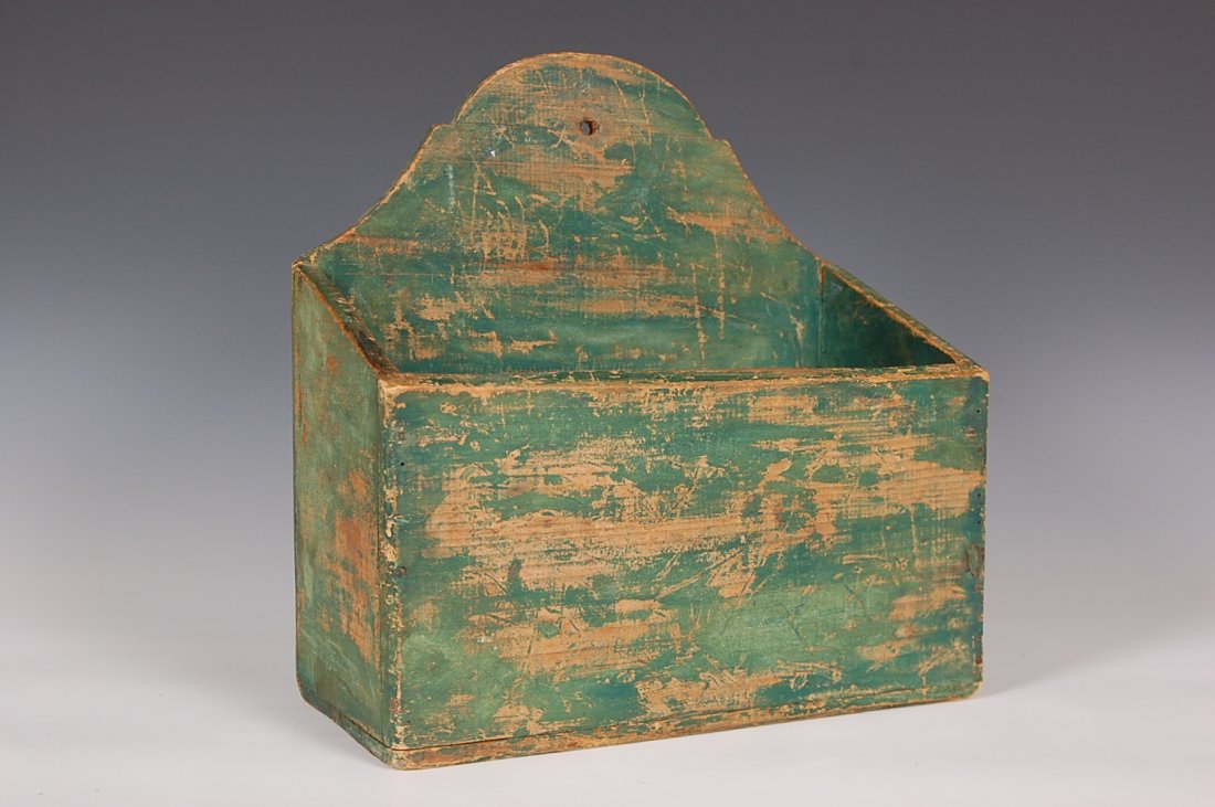 WALL HANGING CANDLE BOX: Scalloped back, white pine, square nails. Pennsylvania characteristics. Measures 12 x 11.75 inches.