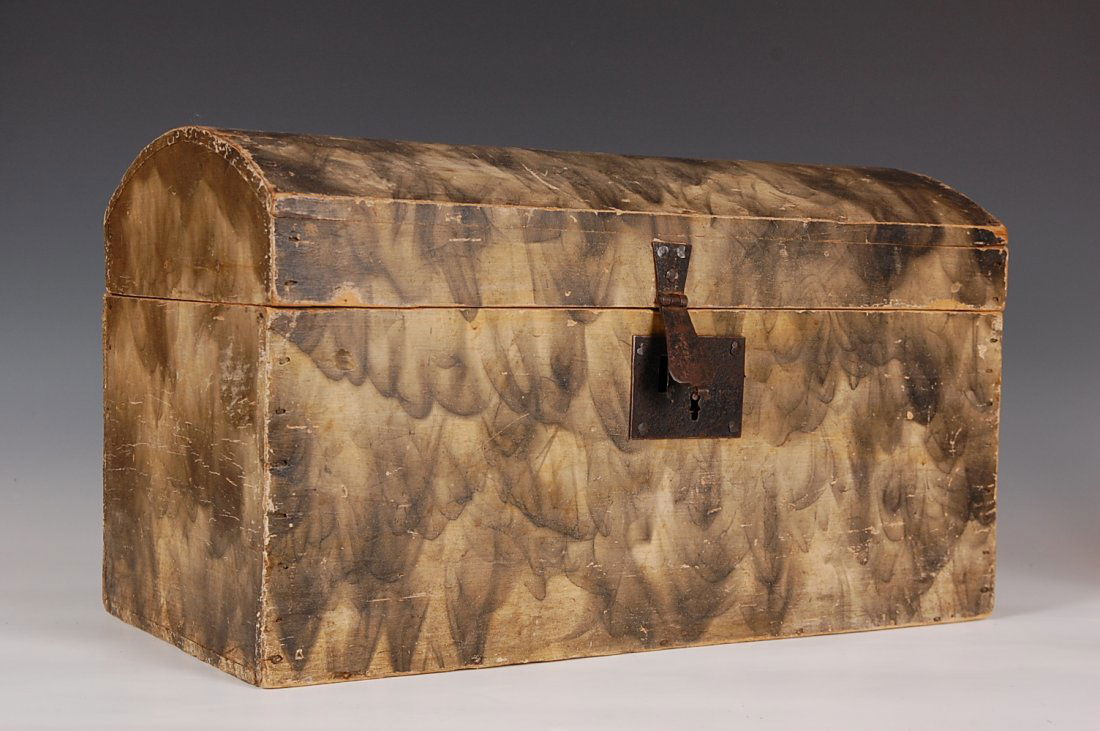 19TH C. SMOKE DECORATED DOME TOP BOX: Dome top, square nails, pine, hand forged hardware, cut nail construction, great smoke decorated surface. Measures 11.75 x 20 x 10.5 inches.