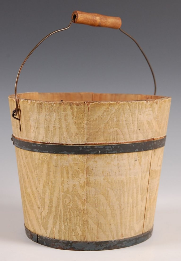 GRAIN DECORATED WOOD STAVE PAIL CIRCA 1900: Grain paint, pine staved construction, metal bands, original bail. Measures 6.25 h x 7.5 inch diameter.