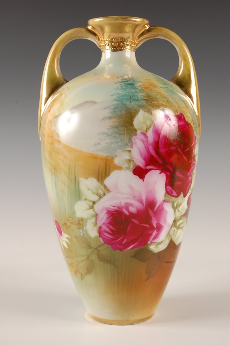 NORITAKE NIPPON HAND PAINTED FLORAL DECORATED VASE: With green Maple leaf mark, measures 10.5 h x 5.25 w inches.