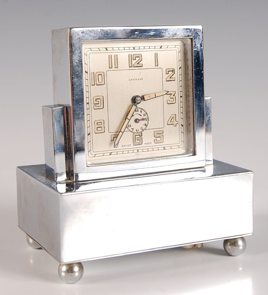 CHROME ART DECO DESK CLOCK: Made by Apollo, wind up musical alarm, measures 4.5 x 4 x 2.5 inches.