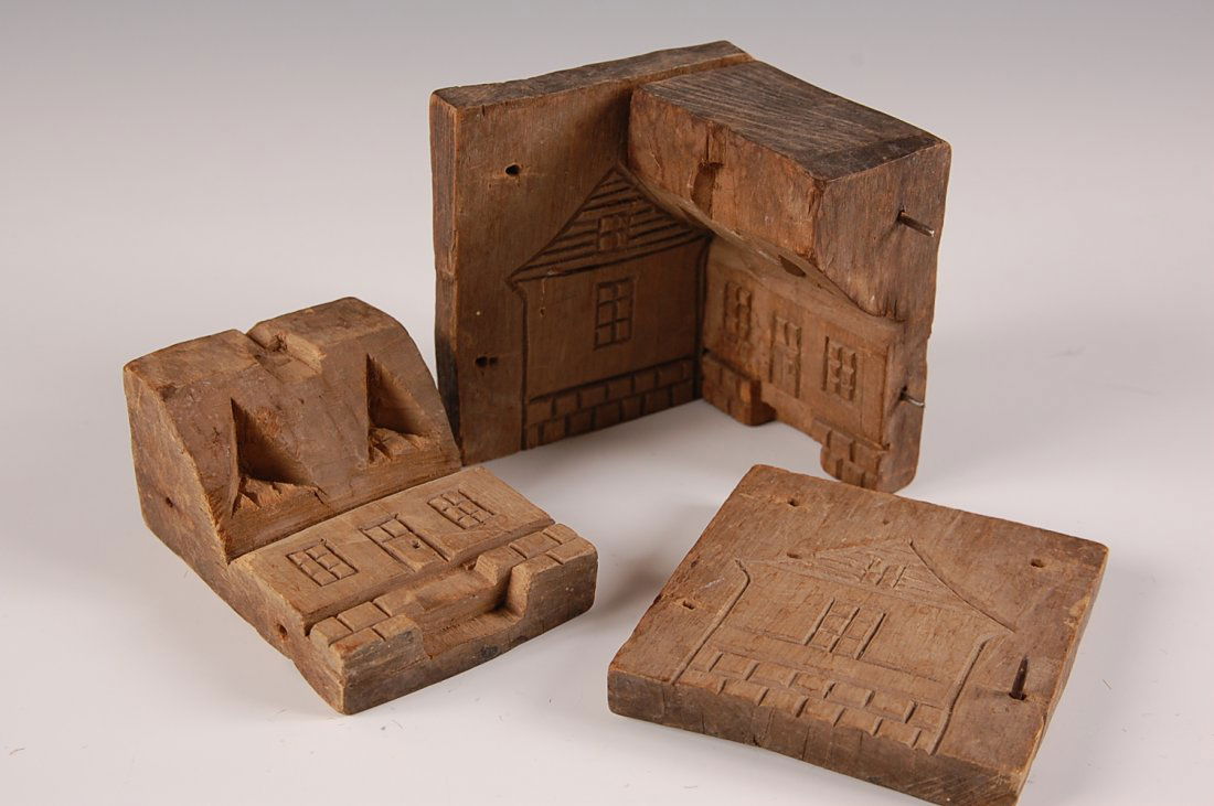 DETAILED CARVED WOOD HOUSE FORM FOUR-SIDED SUGAR MOLD: Mold disassembles into four parts, primitive carving of a house, measures 3.5 x 3.5 inches.