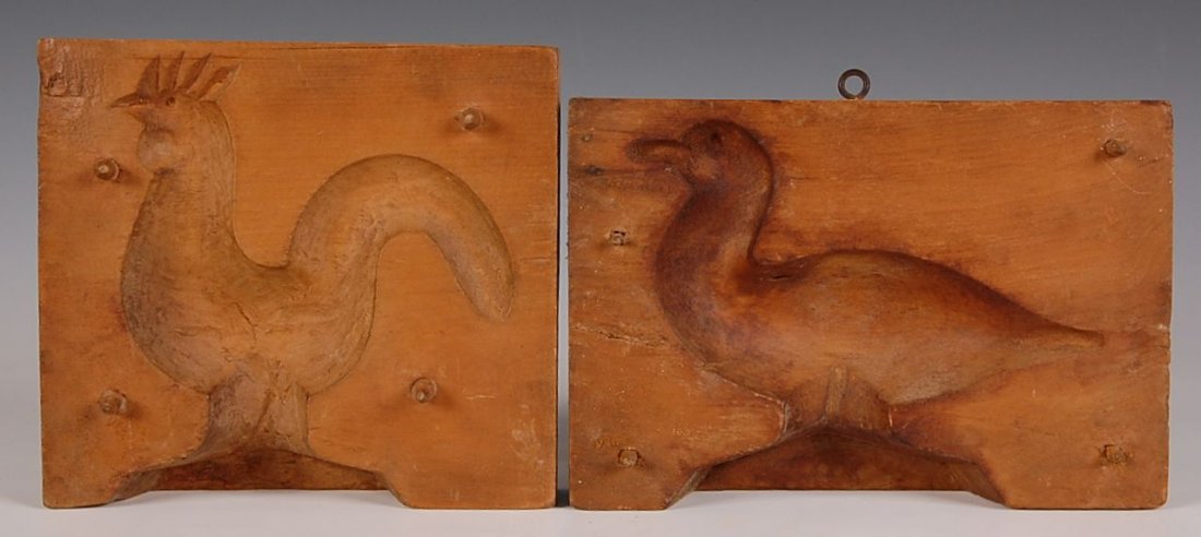 TWO CARVED SUGAR MOLD HALVES, ROOSTER & BIRD: Each only one half of a two piece mold, measure 5.5 x 8 and 6.25 x 6.75 inches each.