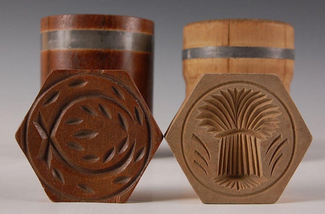 TWO EARLY STAVED BUTTER MOLDS: Sheaf of wheat and an unusual wreath each measures 4.75 inches high and approximately 3.75 inches diameter.