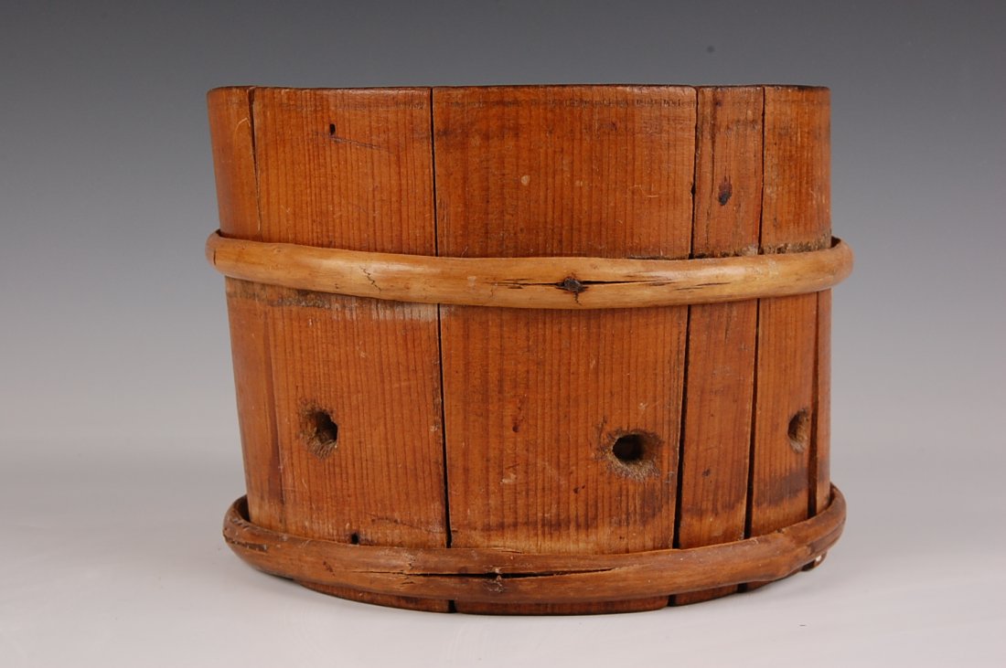 19TH C. STAVED PINE CHEESE DRAIN WITH PINWHEEL PATTERN: Yellow pine with willow bands. Measures 5.25 x 7.5 inches.