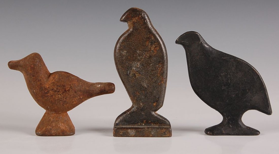 THREE ANTIQUE CAST IRON SHOOTING GALLERY TARGETS: Measure 3.25 x 4.25 x 1.25, 4 x 3.25 x 0.75, and 5 x 2.25 x 1.5 inches.