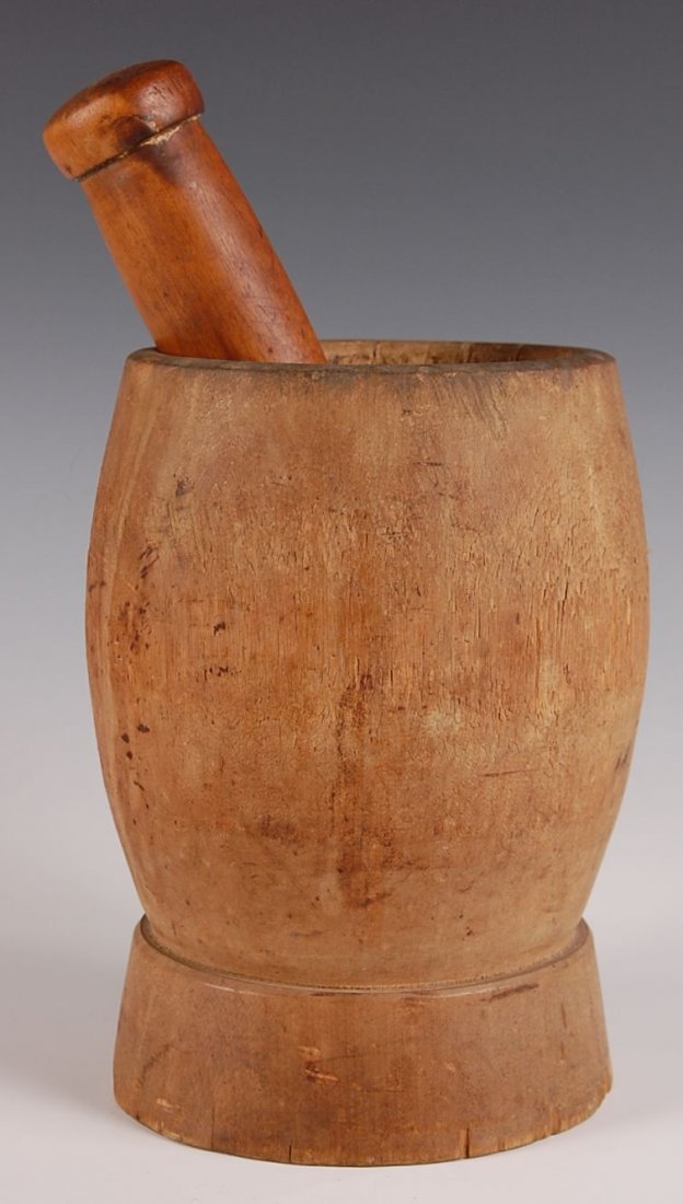 19TH CENTURY WOOD MORTAR AND PESTLE: Measures 8 x 5 inches.