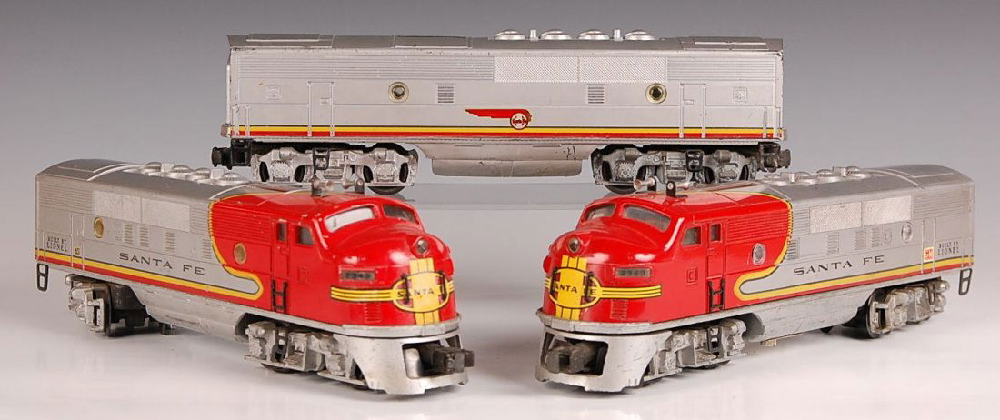 TWO LIONEL 2343 ENGINES, AND 2343C: Two engines, single car. All show wear and use, average condition.