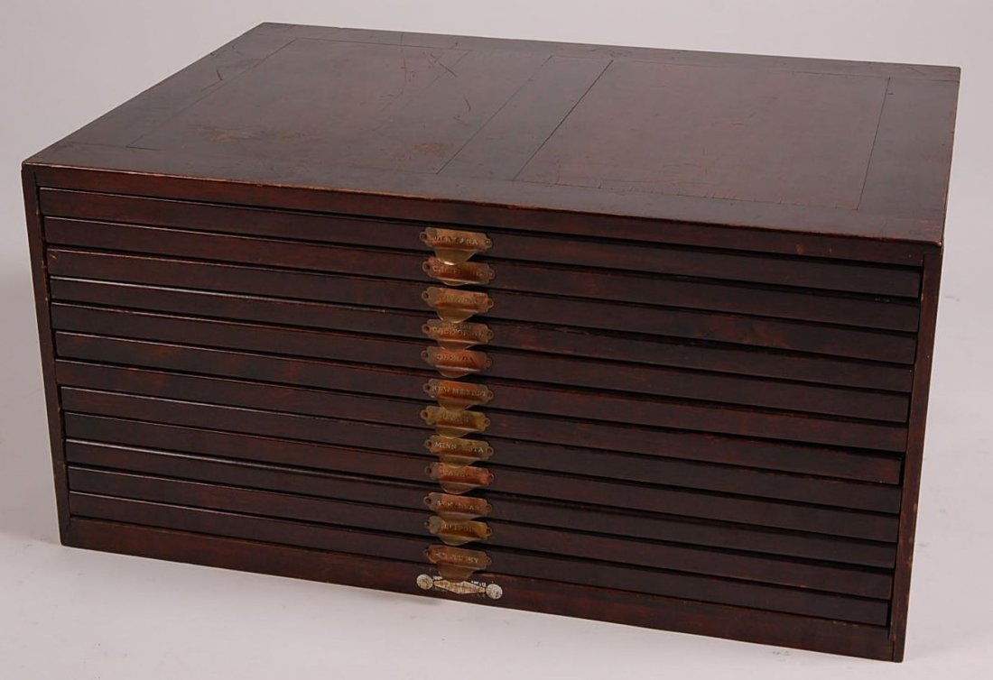 TWELVE DRAWER MAP CASE: Measures 14.25 x 29.25 x 21.5 inches. Each drawer with metal pulls, having state name.