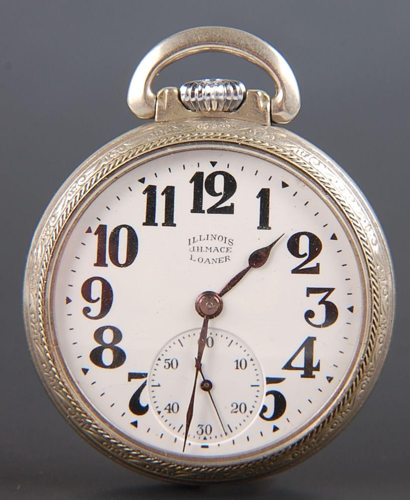 ILLINOIS 19J BUNN SPECIAL, J.H. MACE LOANER WATCH: A 16 size Illinois watch marked on the dial, ' Illinois Loaner J.H. Mace', a silveroid case with 'J.H. Mace Company Union Station K.C., MO 279' engraved on the back cover. The damascened nickel 19 jew