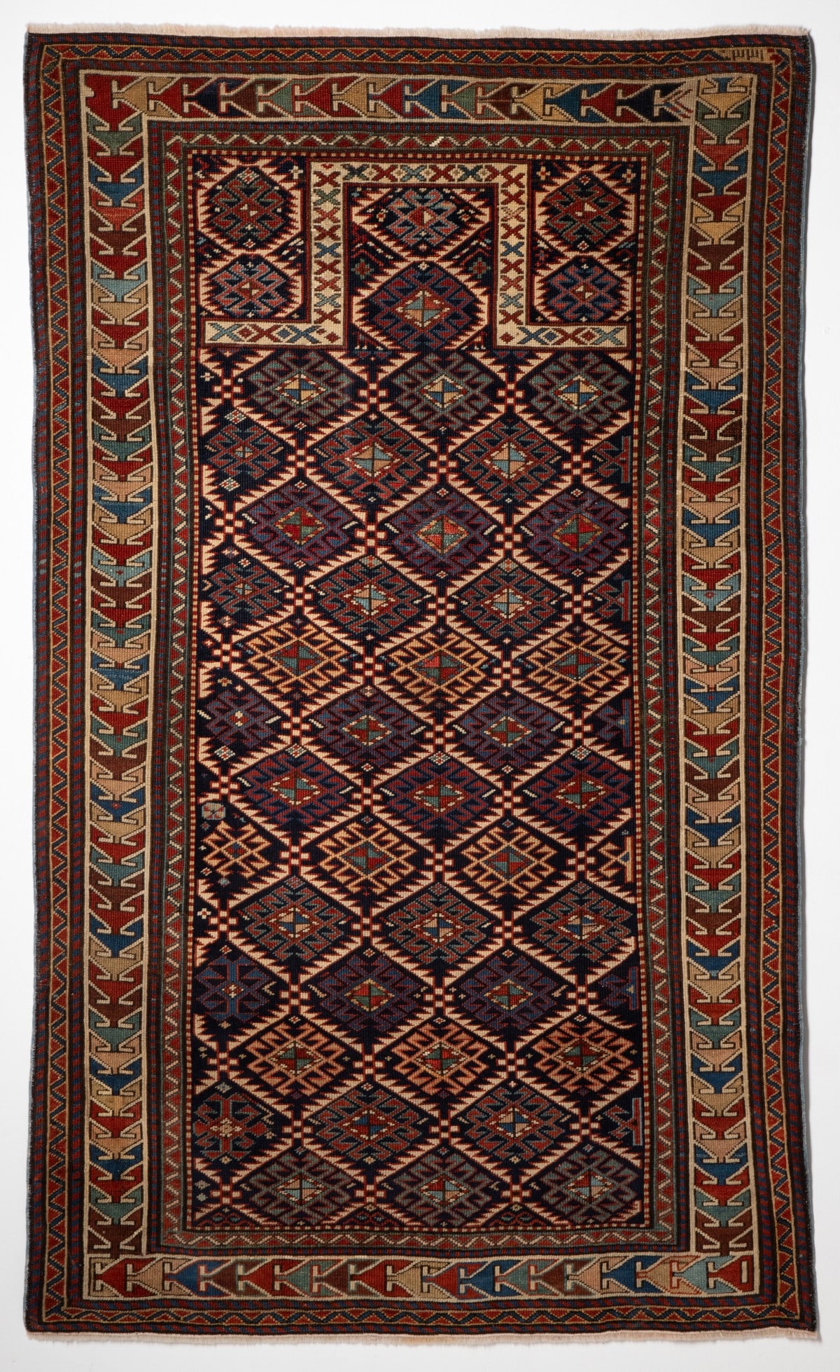 A LATE 19TH CENTURY AKSTAFA PRAYER RUG (1 of 18)